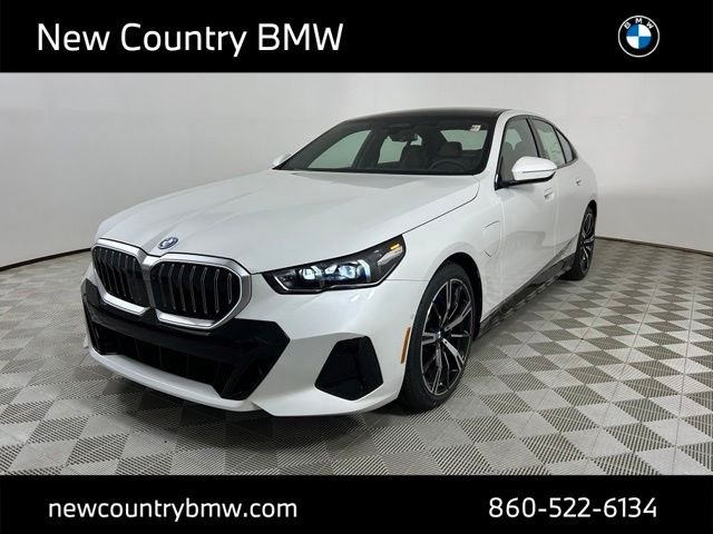 New 2026 Mineral White Metallic BMW 550e xDrive image 3