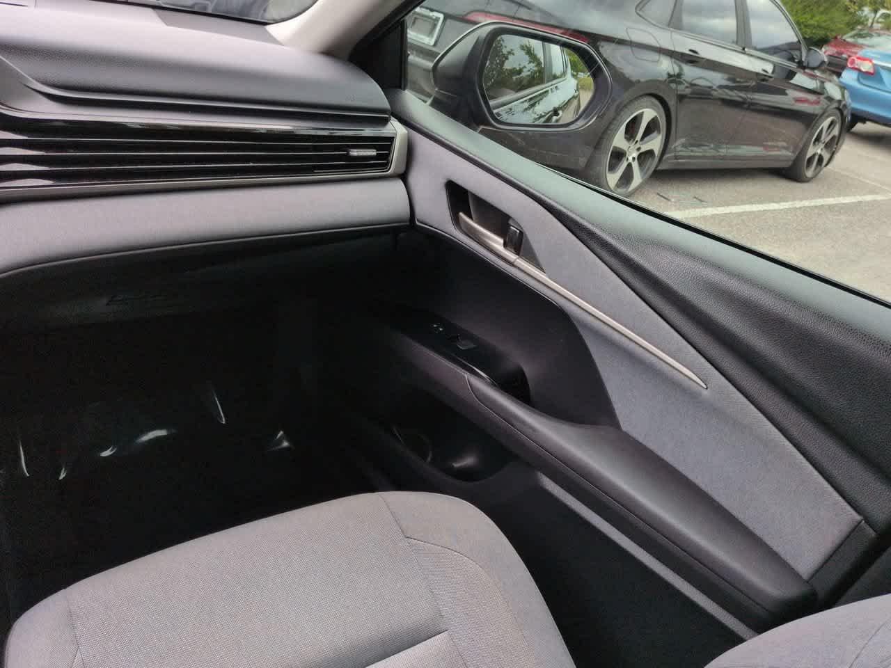 Used 2025 Midnight Black Metallic Toyota LE image 16