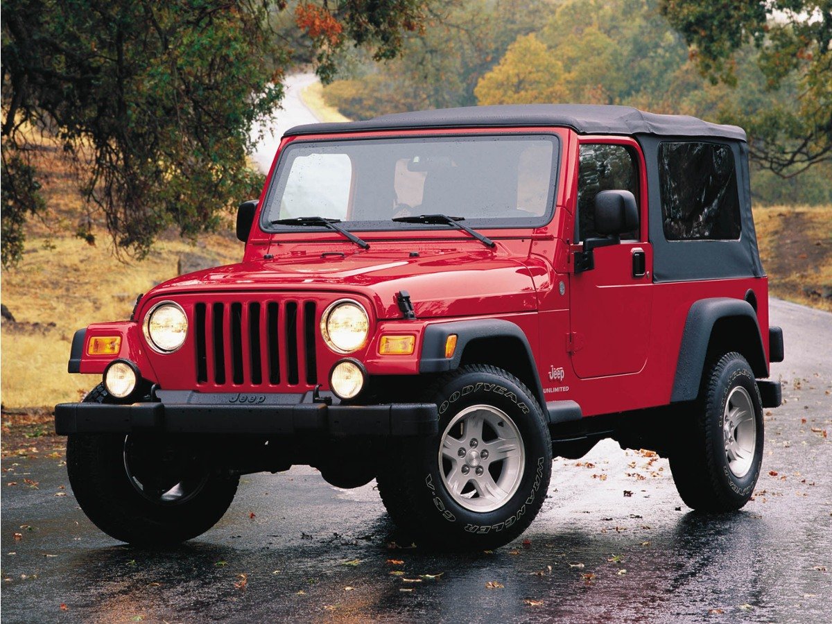 Used 2004 Beige Jeep Sport image 1