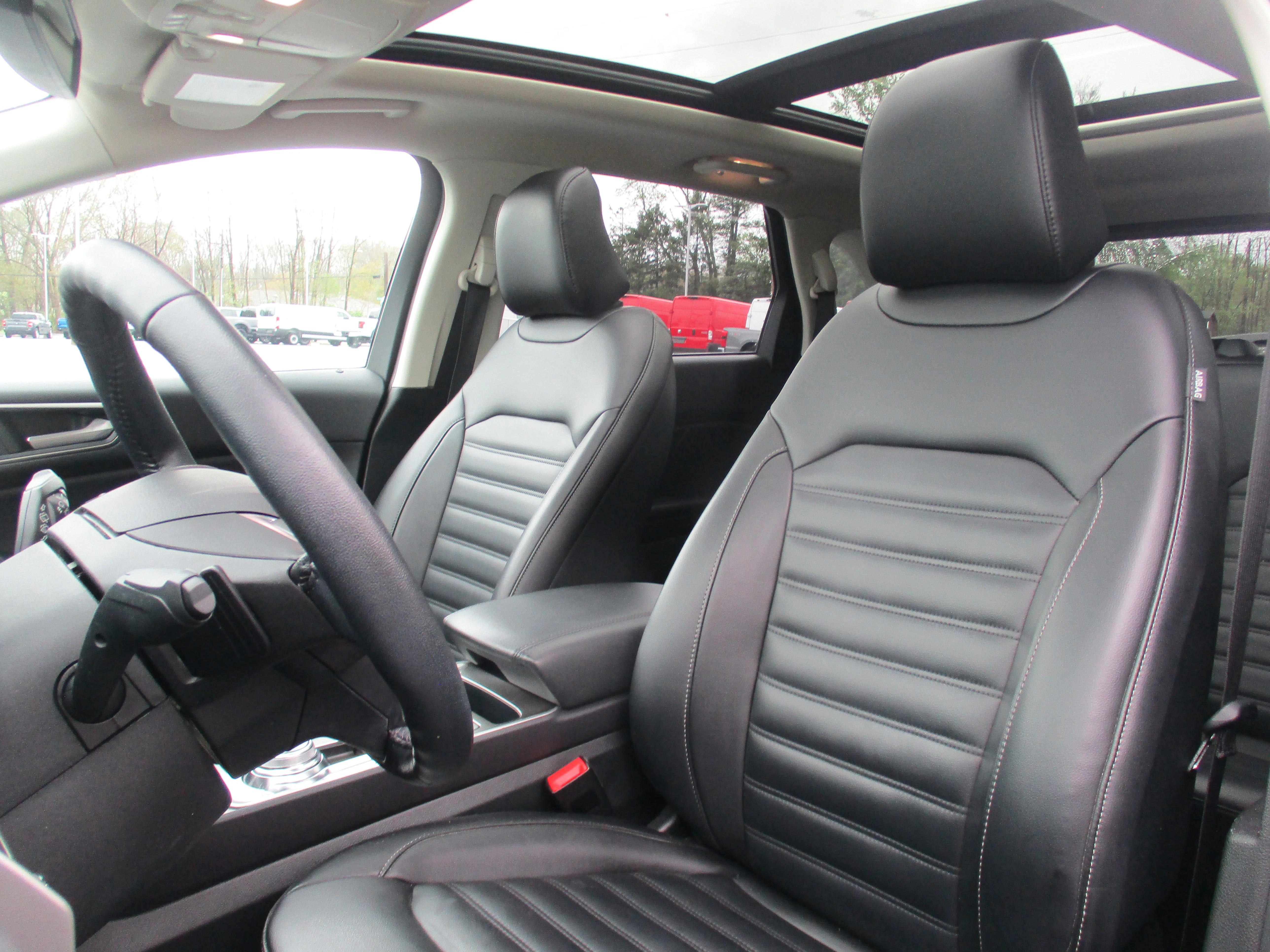 Used 2023 Agate Black Metallic Ford SEL image 24