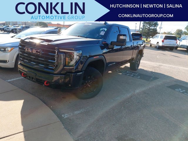 Used 2026 Titanium GMC AT4 image 1