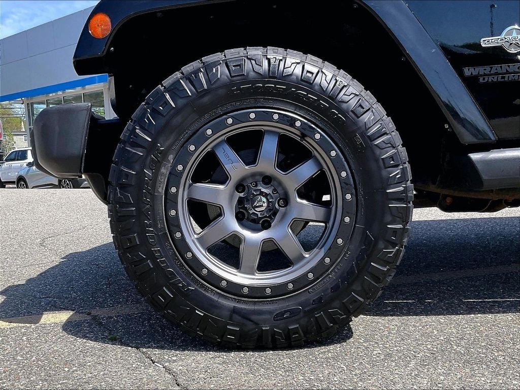 Used 2015 Black Jeep Unlimited Freedom Edition image 7