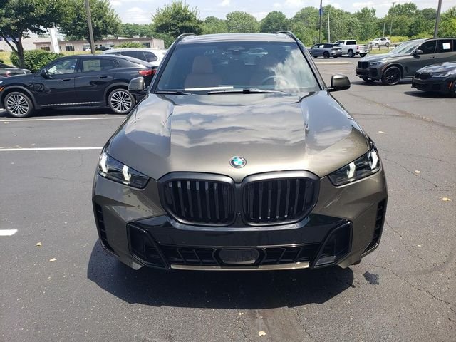 New 2026 Manhattan Green Metallic BMW xDrive40i image 10