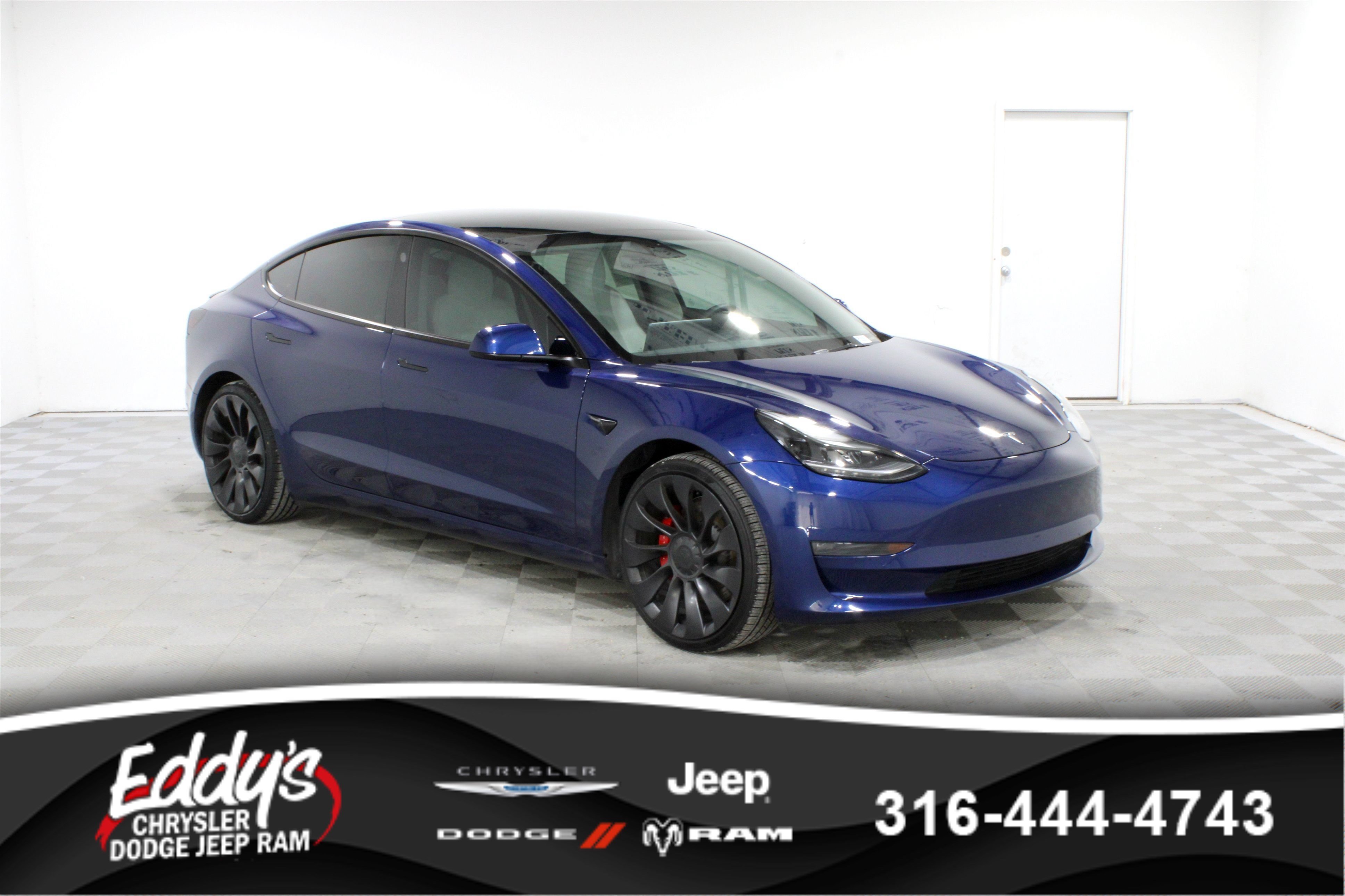 Used 2022 Deep Blue Metallic Tesla Performance image 1