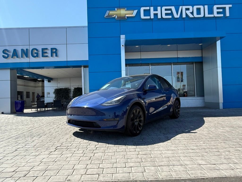 Used 2024 Tesla Model Y Long Range with VIN 7SAYGDEE7RA218431 for sale in Sanger, CA