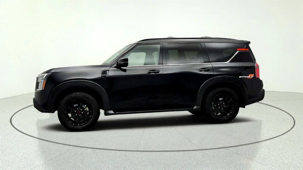Used 2025 Super Black Nissan 4x4 PRO-4X w/ Cross Bars image 8