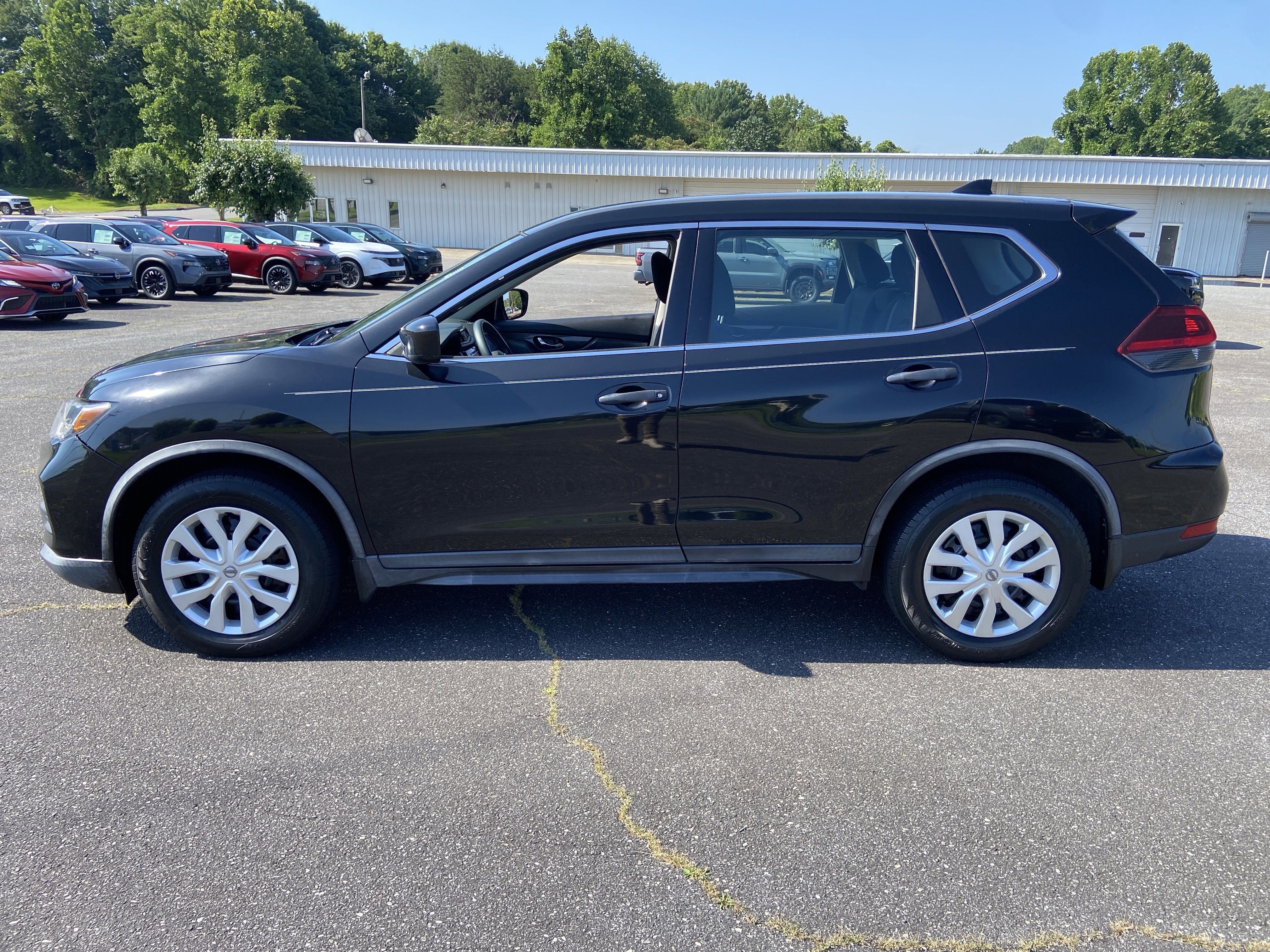 Used 2018 Magnetic Black Nissan S image 7