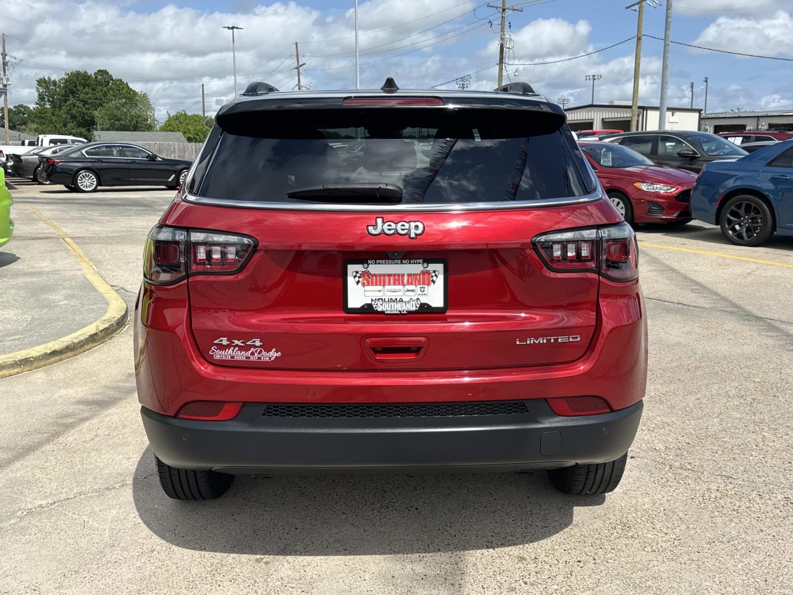 Used 2025 Red Hot Pearlcoat Jeep Limited image 6