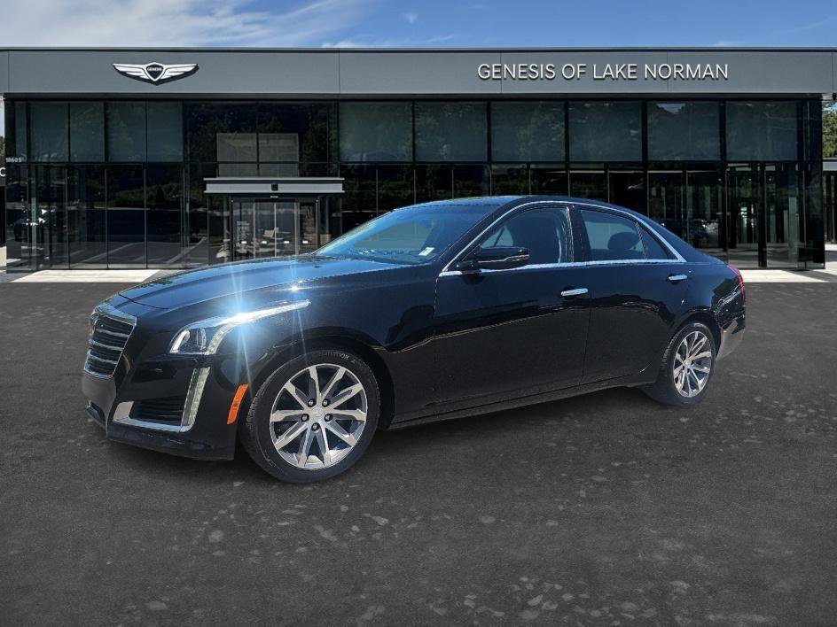 Used 2016 Black Raven Cadillac Luxury Collection RWD image 1