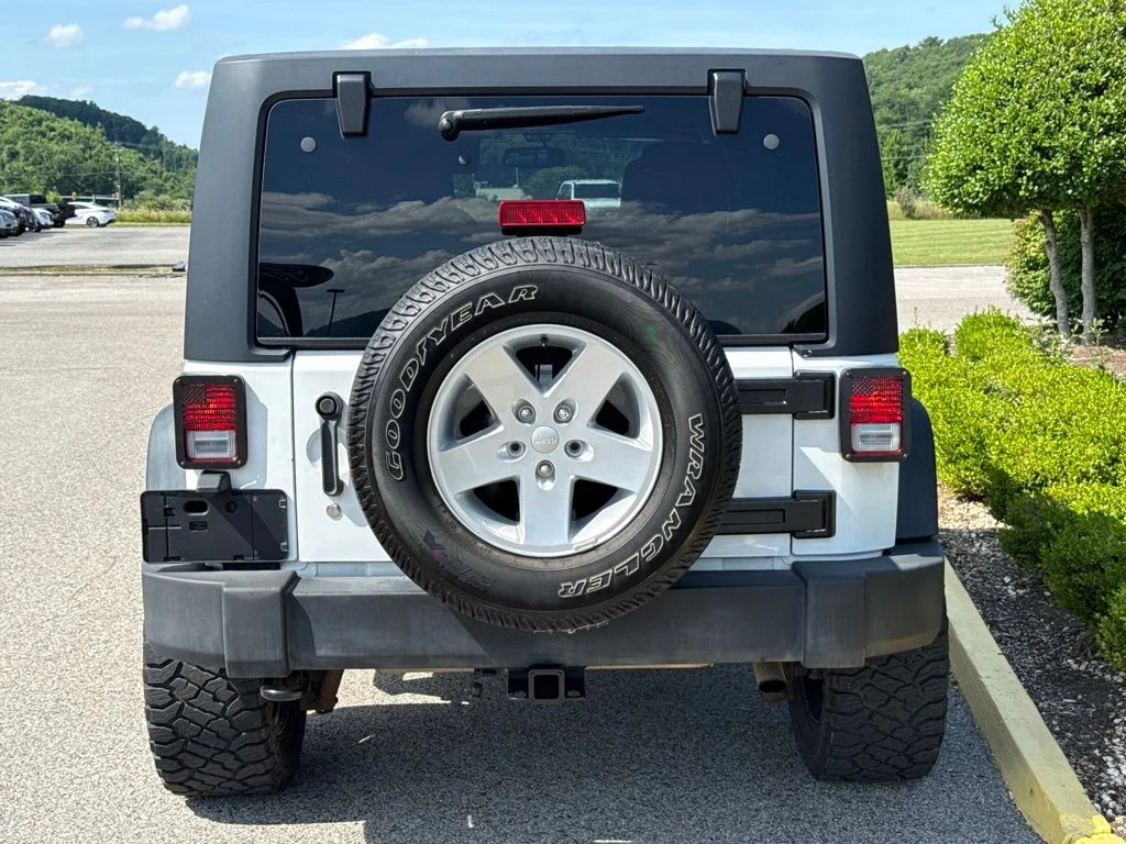 Used 2013 Bright White Jeep Unlimited Sport image 5