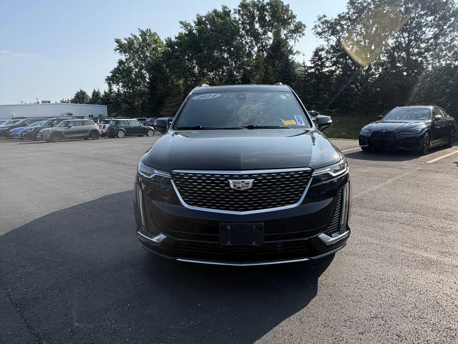 Used 2024 Stellar Black Metallic Cadillac AWD Premium Luxury image 2