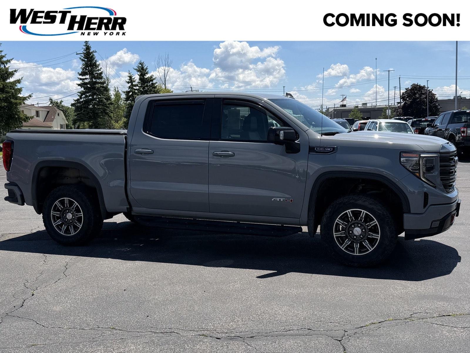 Used 2024 Thunderstorm Gray GMC AT4 image 1