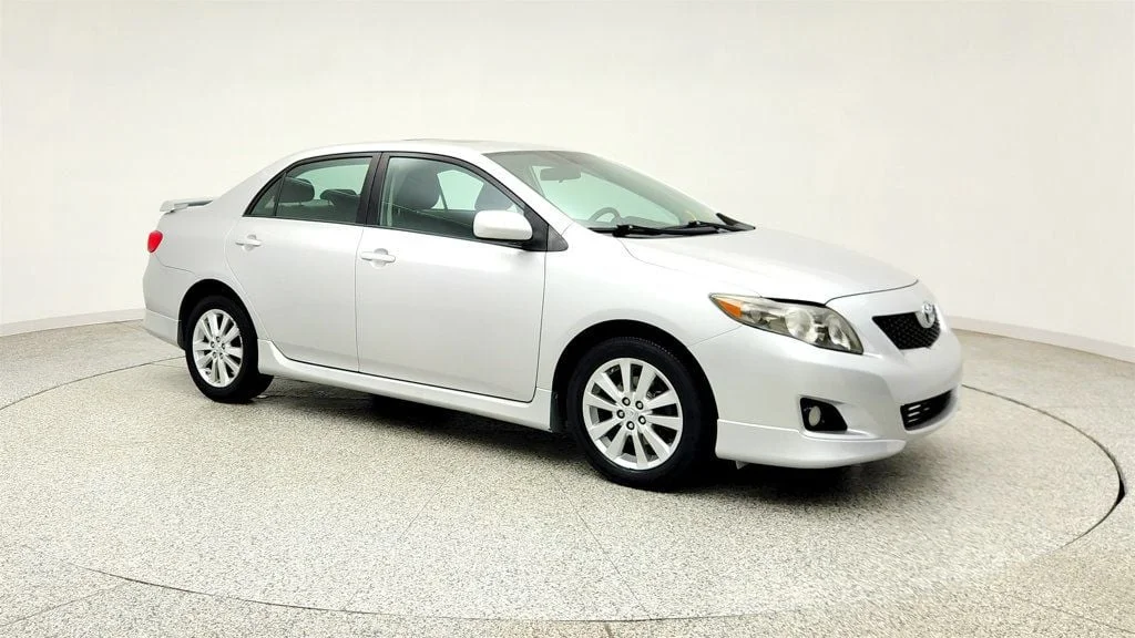 Used 2010 Classic Silver Metallic Toyota 4dr Sedan Manual S w/ Power Moonroof & 16