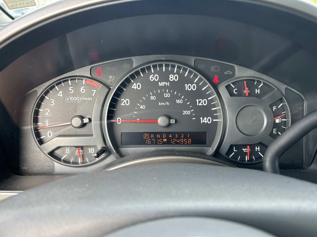 Used 2006 Red Alert Nissan XE image 22