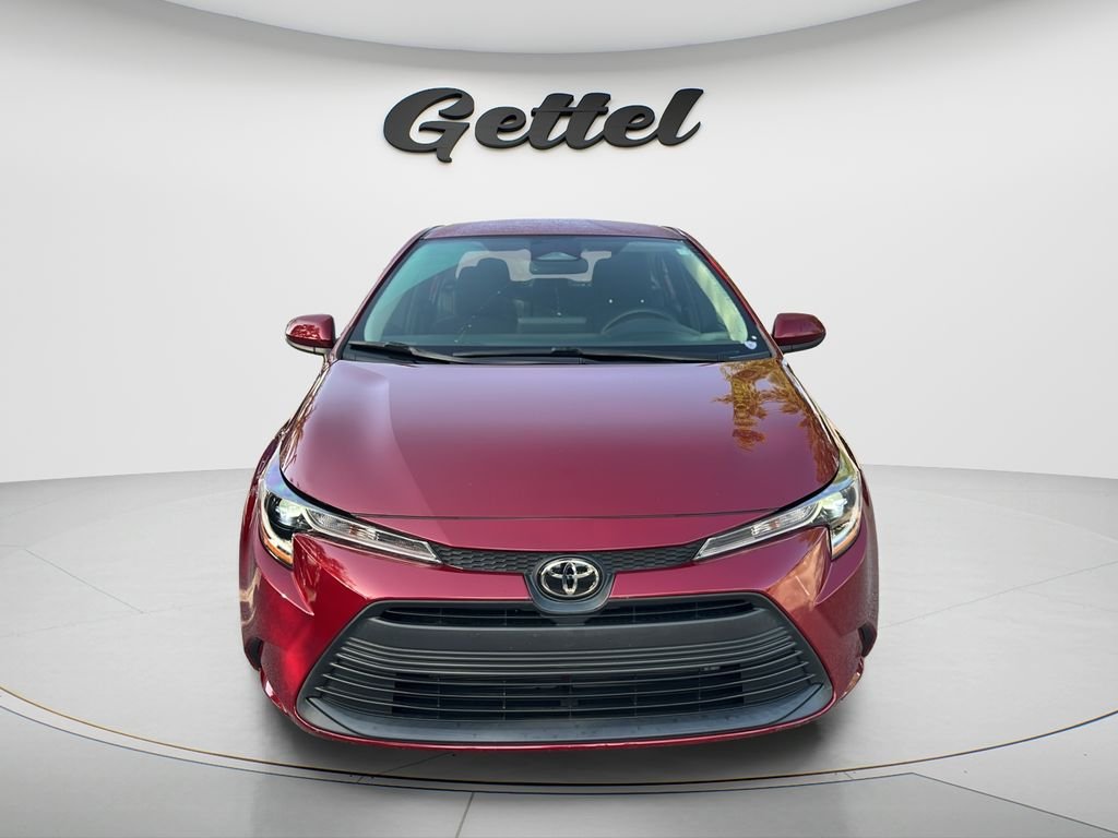 Used 2024 Red Toyota LE image 2