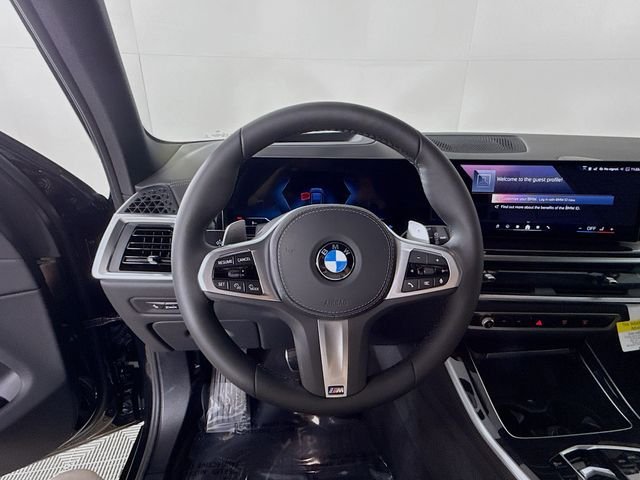 New 2026 Black Sapphire Metallic BMW xDrive40i image 11