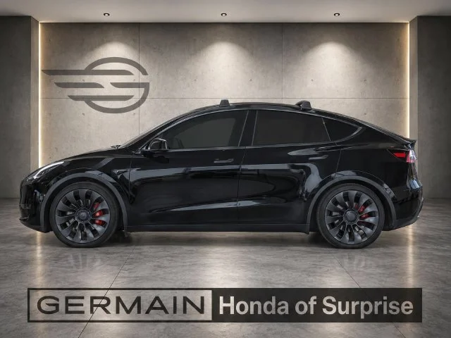 Used 2023 Solid Black Tesla Performance image 3