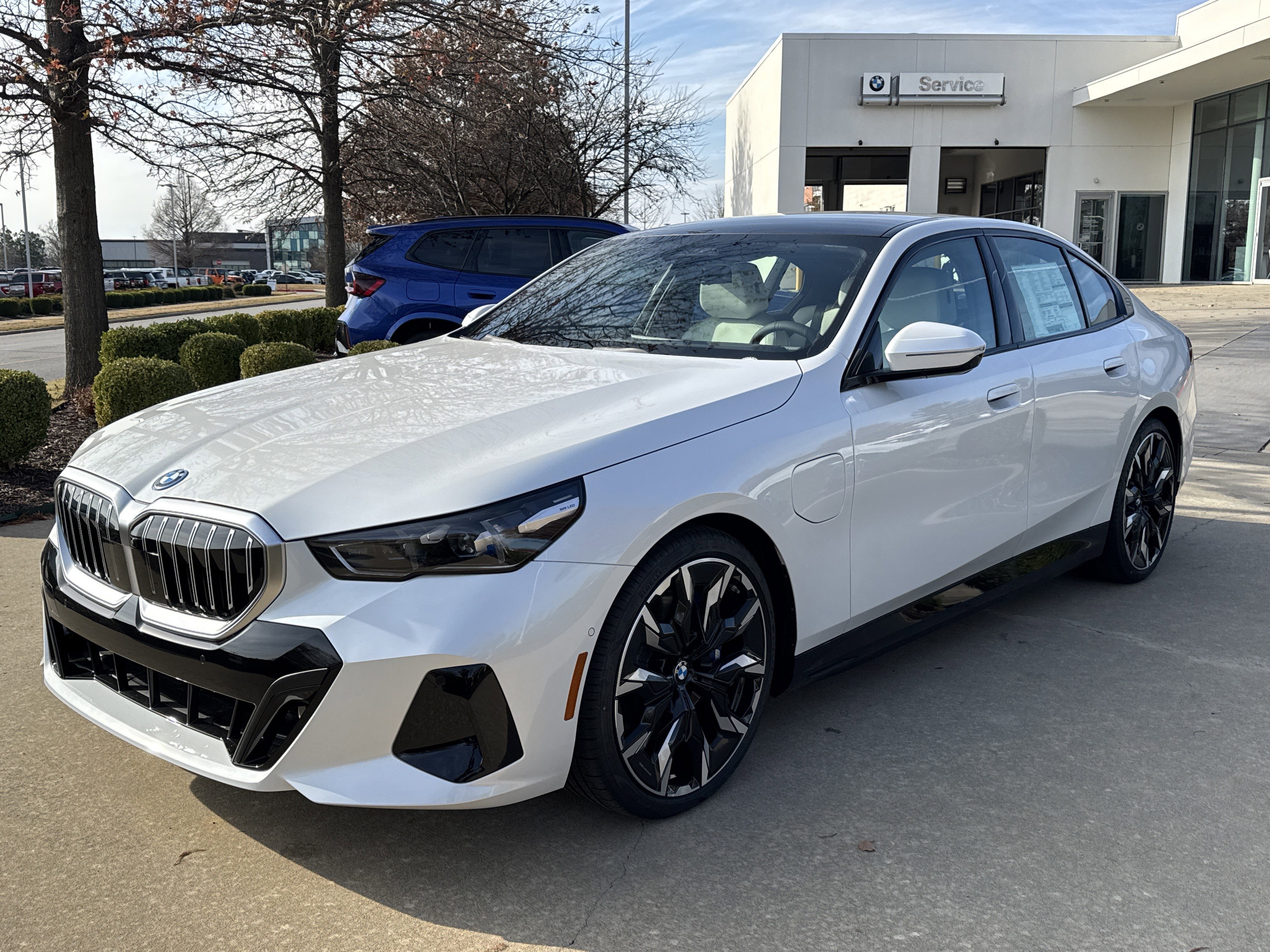 2026 BMW 5 Series 550e xDrive Sedan's photo