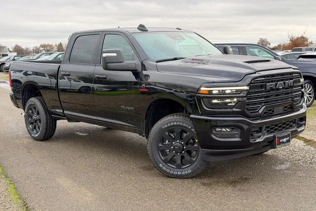 New 2026 Diamond Black Crystal Pearl-Coat Exterior Paint RAM Laramie image 2