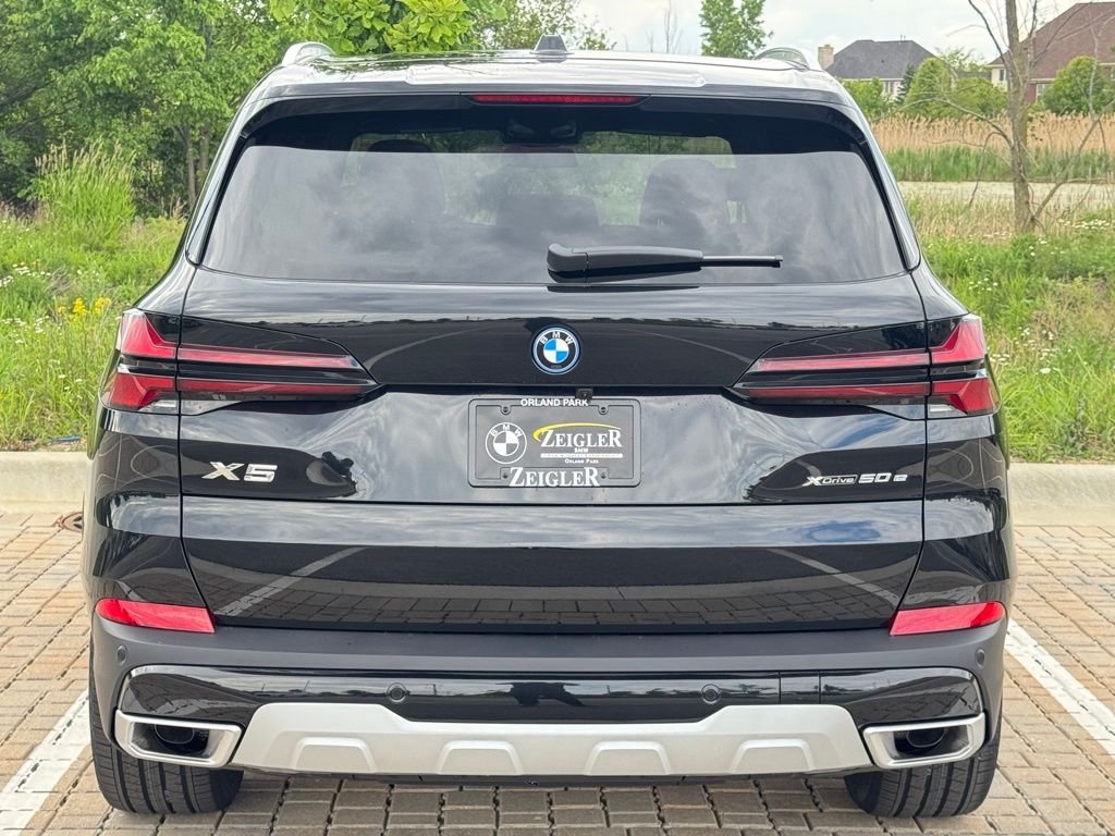 Used 2026 Black Sapphire Metallic BMW xDrive50e image 5
