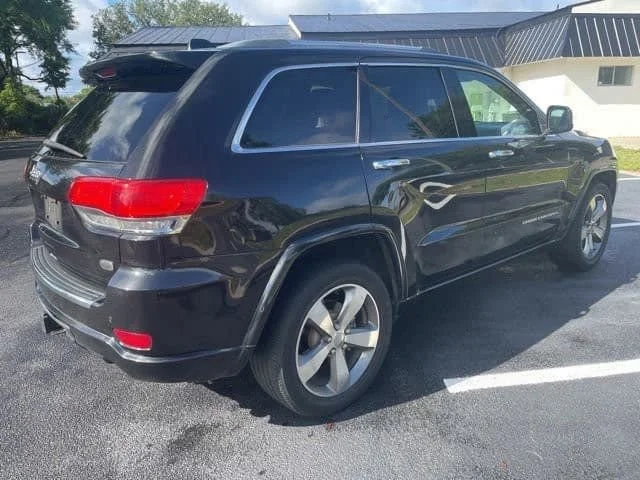 Used 2014 Brilliant Black Jeep Overland image 5