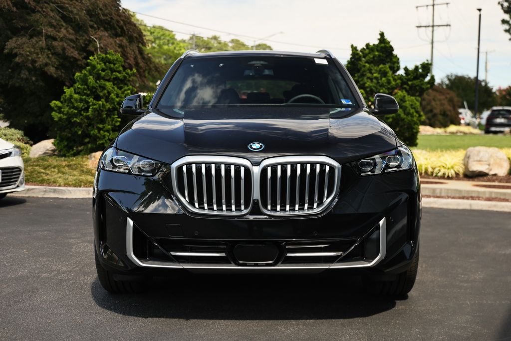 New 2026 Black Sapphire Metallic BMW xDrive50e image 13