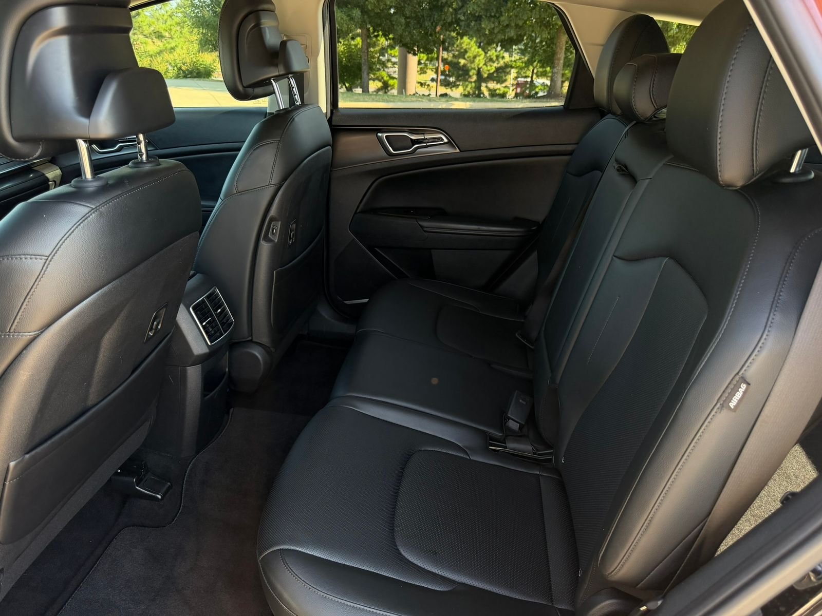 Used 2024 Ebony Black Kia EX image 25