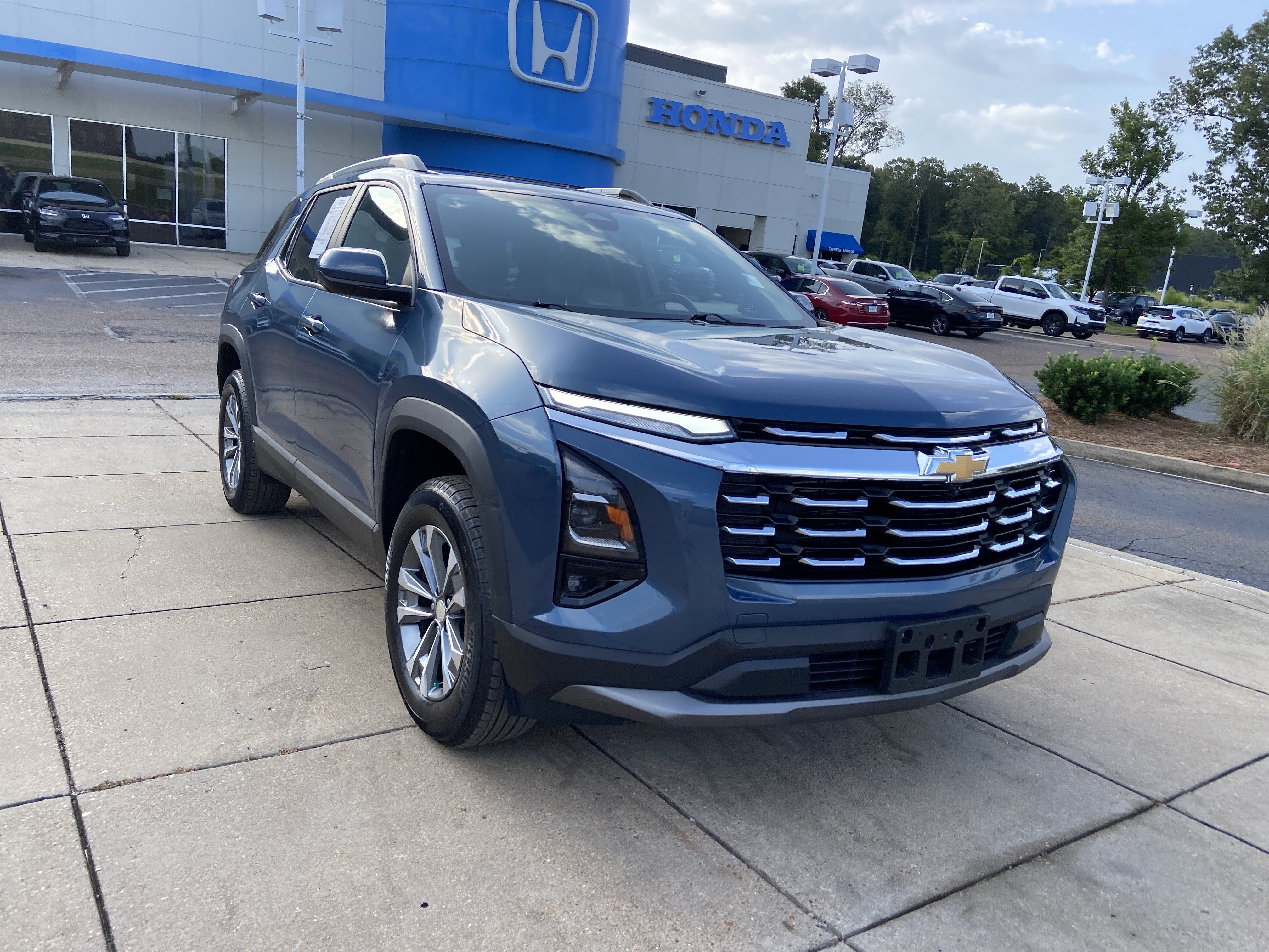 Used 2025 Lakeshore Blue Metallic Chevrolet AWD LT image 2