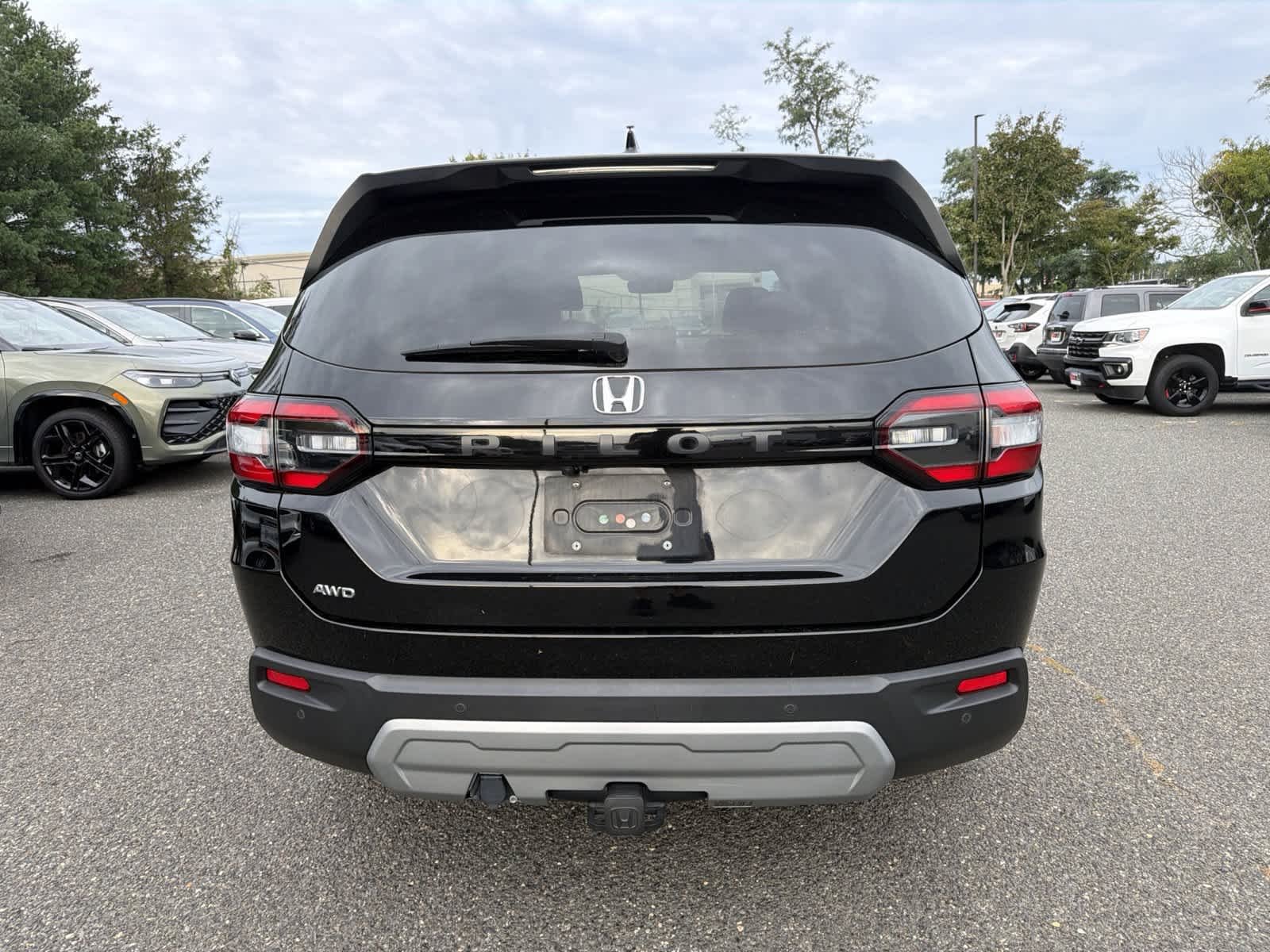 Used 2023 Crystal Black Pearl Honda EX-L 7 Passenger image 4