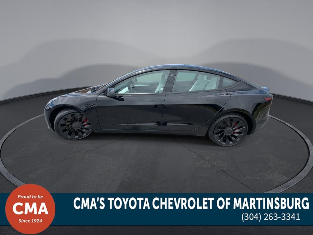 Used 2022 Solid Black Tesla Performance image 5