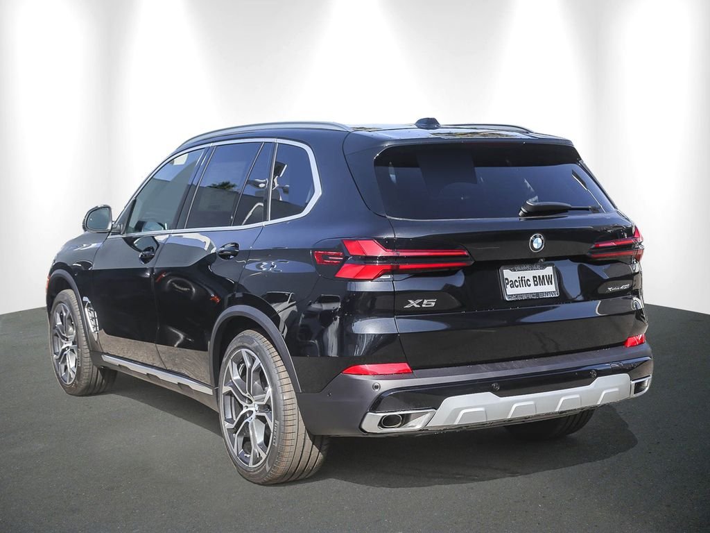 New 2026 Black Sapphire Metallic BMW xDrive40i image 4