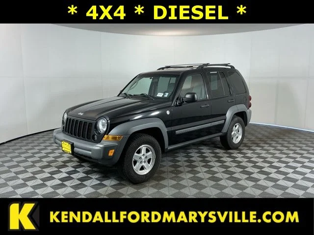 Used 2005 Black Jeep Sport image 1