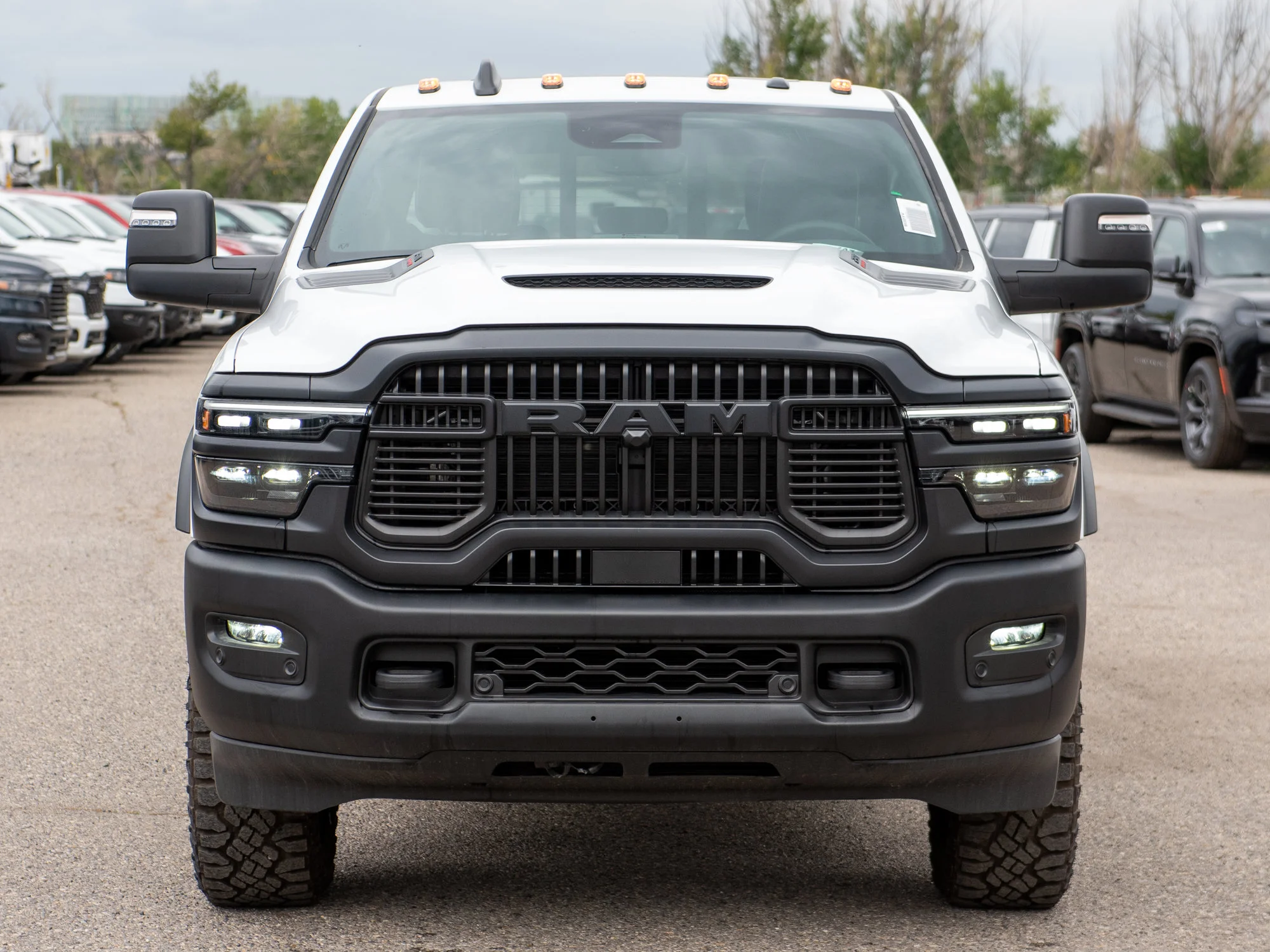 New 2026 White RAM Rebel* Crew Cab 4x4, 6.7L Cummins, Sunroof, 34 Inch A/T Tires, Passenger Screen image 11