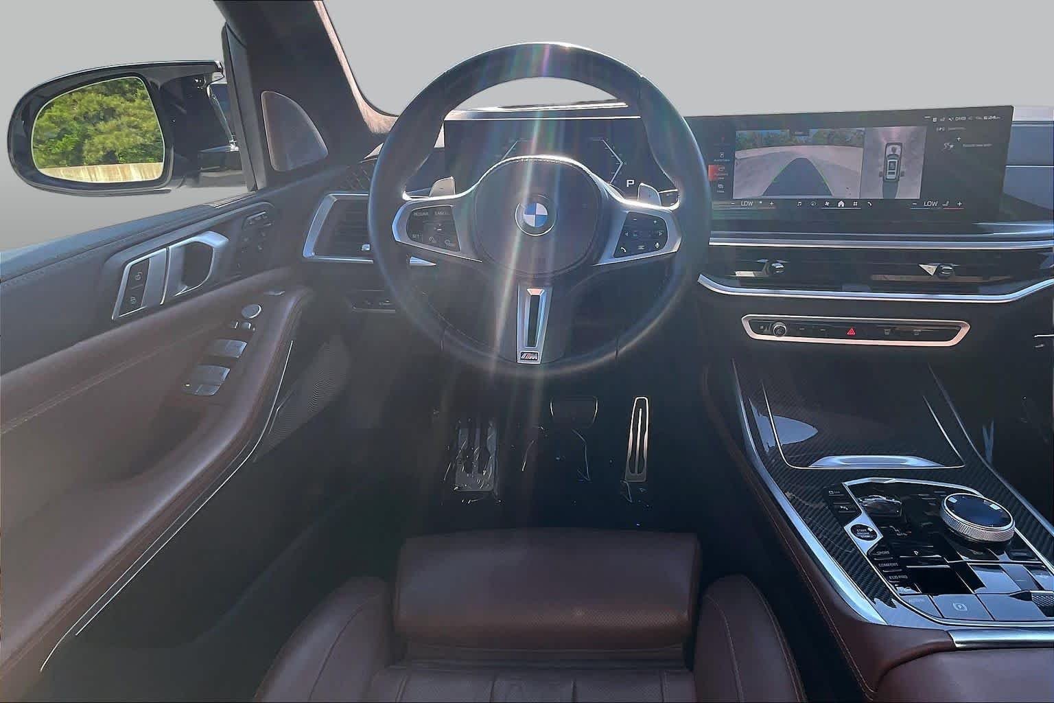 Used 2025 Mineral White Metallic BMW M60i image 6