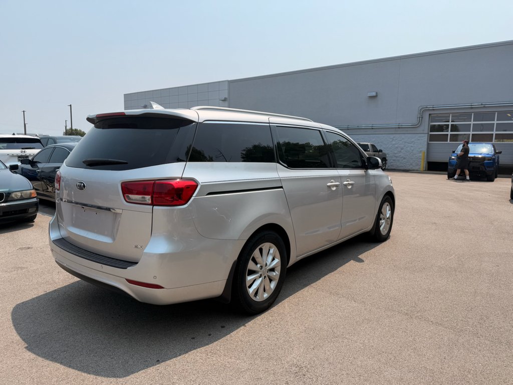 Used 2017 Bright Silver Kia EX image 4
