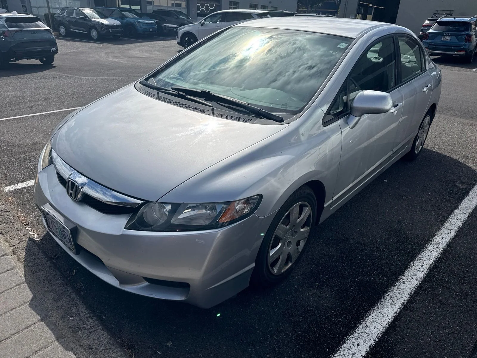Used 2010 Alabaster Silver Metallic Honda LX image 1