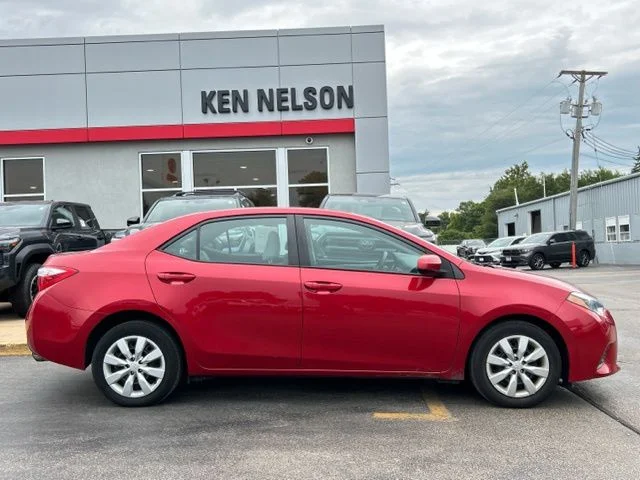 Used 2016 Barcelona Red Metallic Toyota LE image 13
