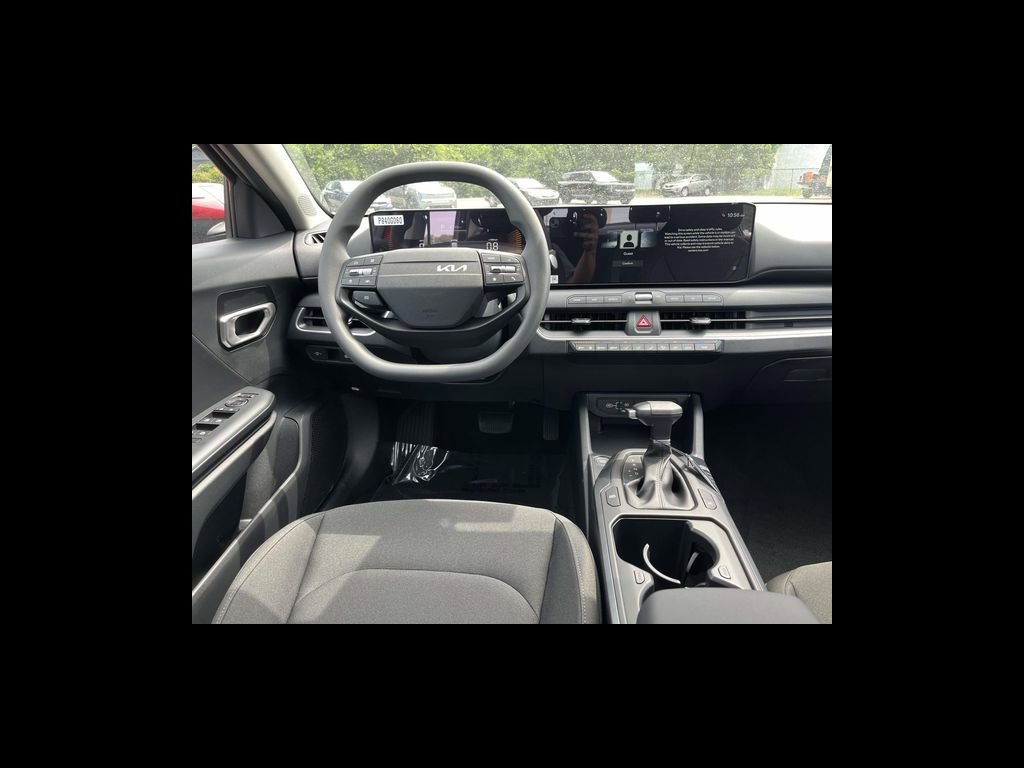 New 2026 Currant Red Kia LXS image 8