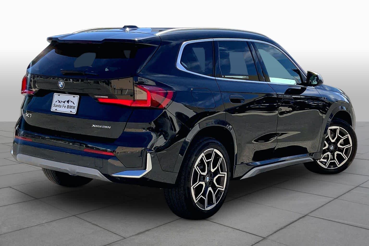 Used 2023 Black Sapphire Metallic BMW xDrive28i image 12