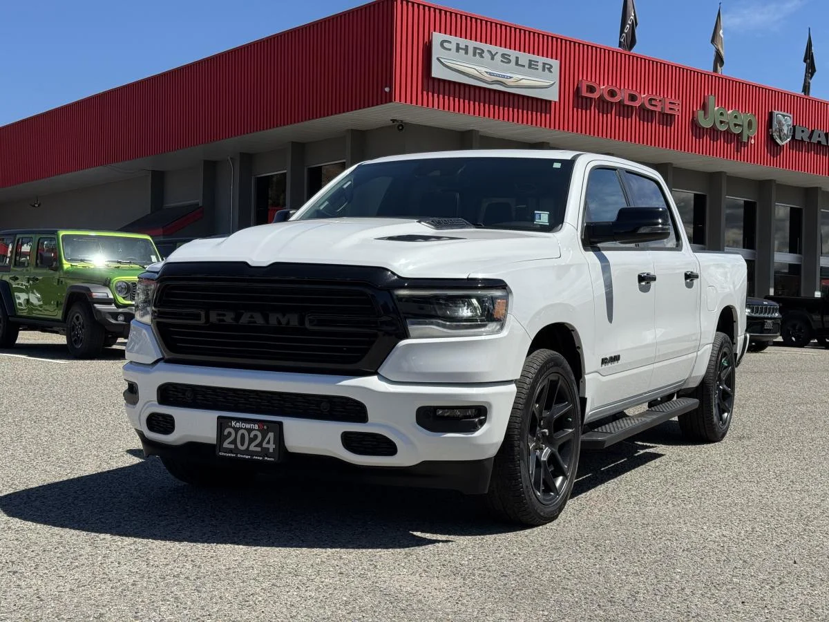 Used 2024 White RAM Laramie 4x4 Crew Cab image 1