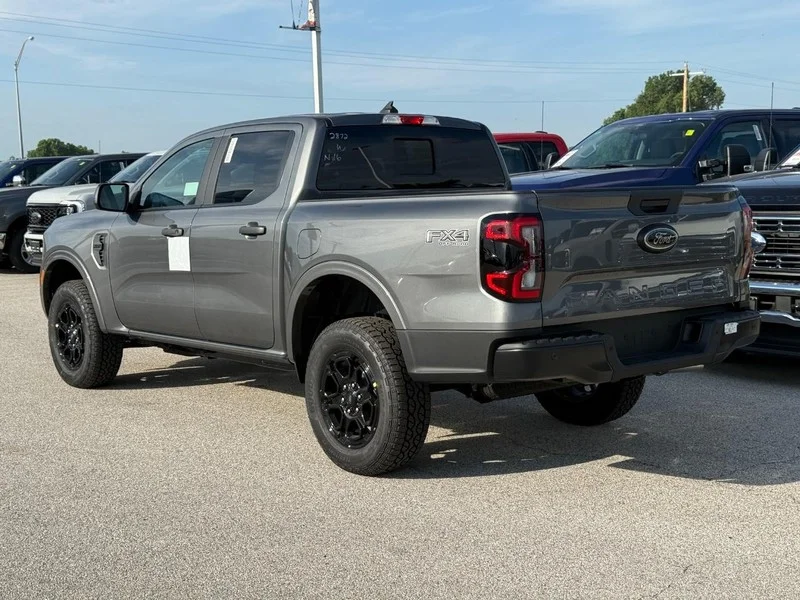 New 2026 Carbonized Gray Metallic Ford XLT 4WD SuperCrew 5