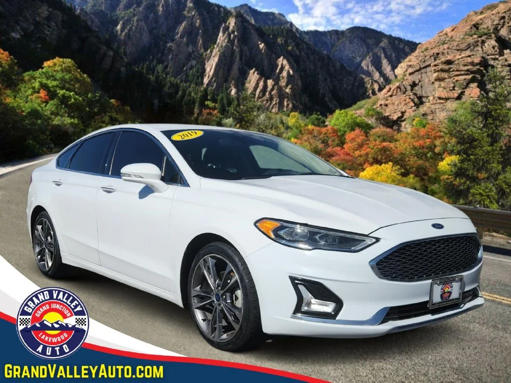 Used 2019 White Ford Titanium image 1
