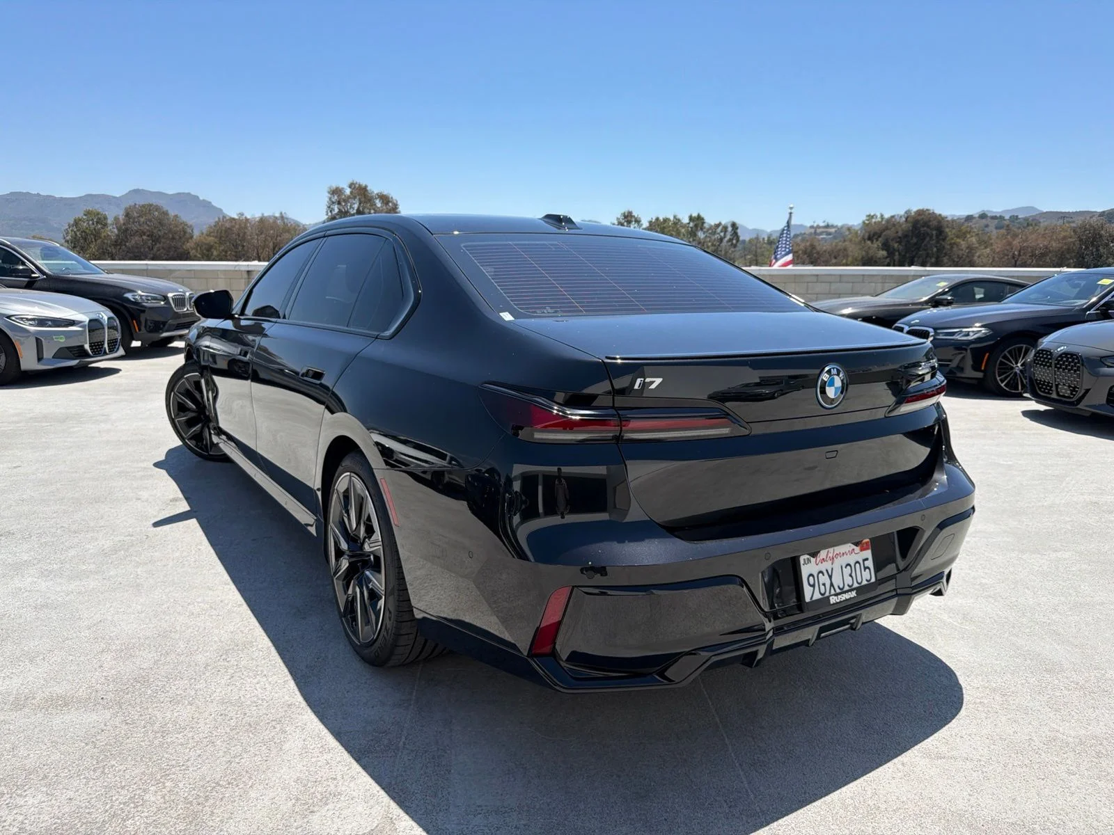 Certified Used 2023 Black Sapphire Metallic BMW xDrive60 image 2