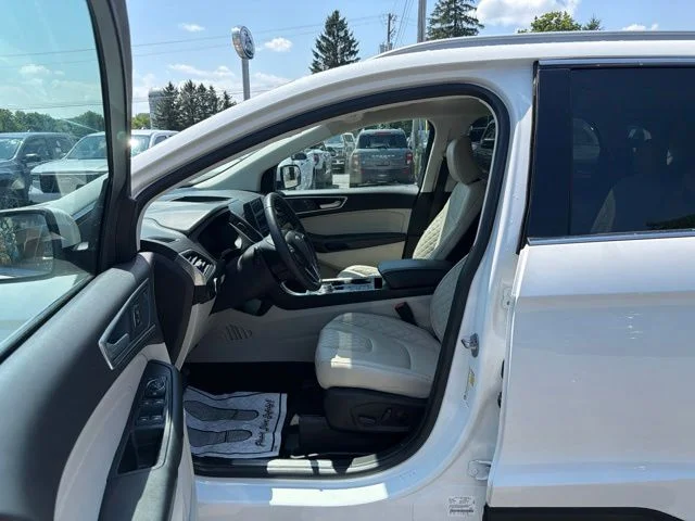 Used 2023 White Metallic Ford Titanium image 19