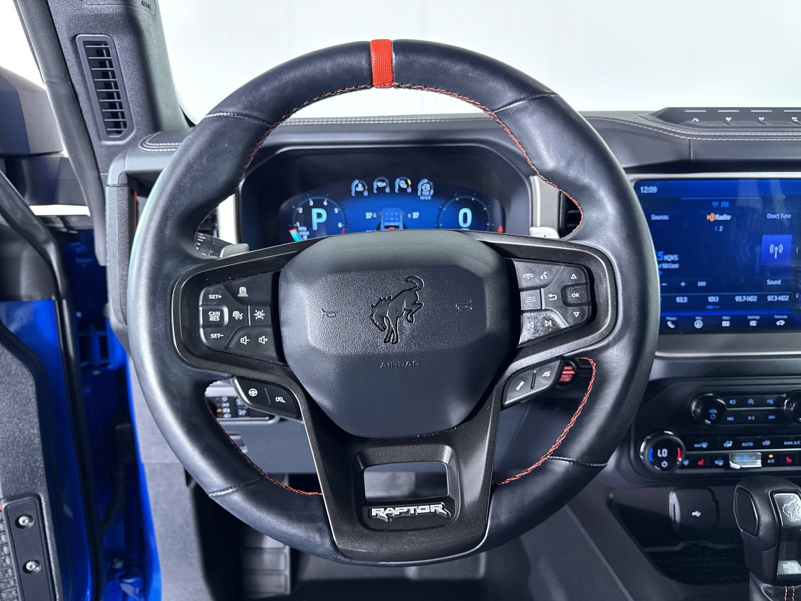 Used 2024 Velocity Blue Metallic Ford Raptor image 16