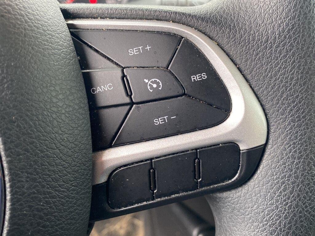 Used 2018 Omaha Orange Jeep Sport image 19