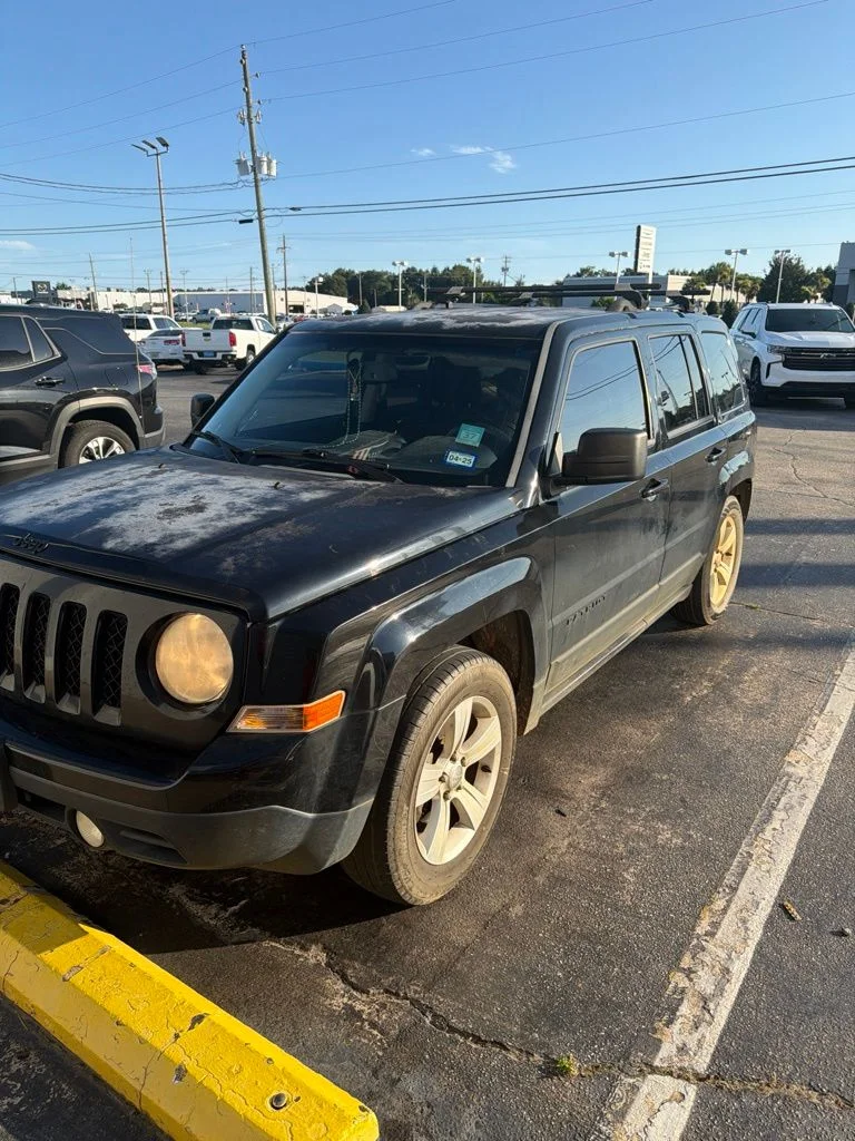 Used 2014 Black Jeep Sport image 1