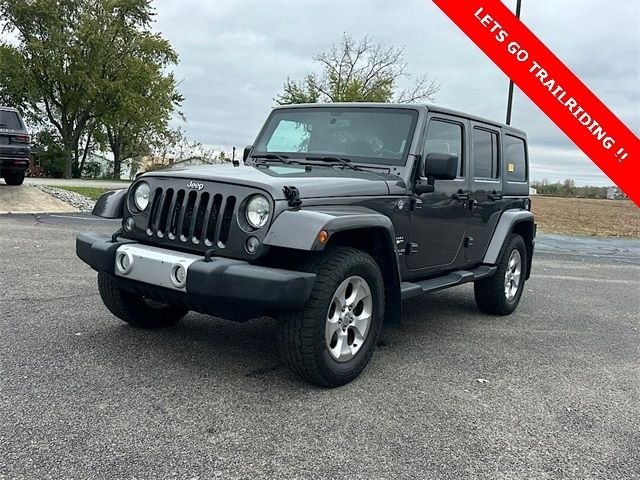 Used 2014 Gray Jeep Unlimited Sahara image 3