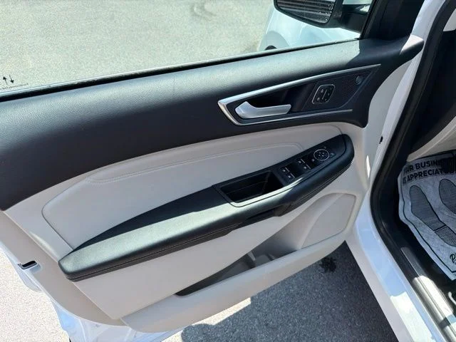 Used 2023 White Metallic Ford Titanium image 60