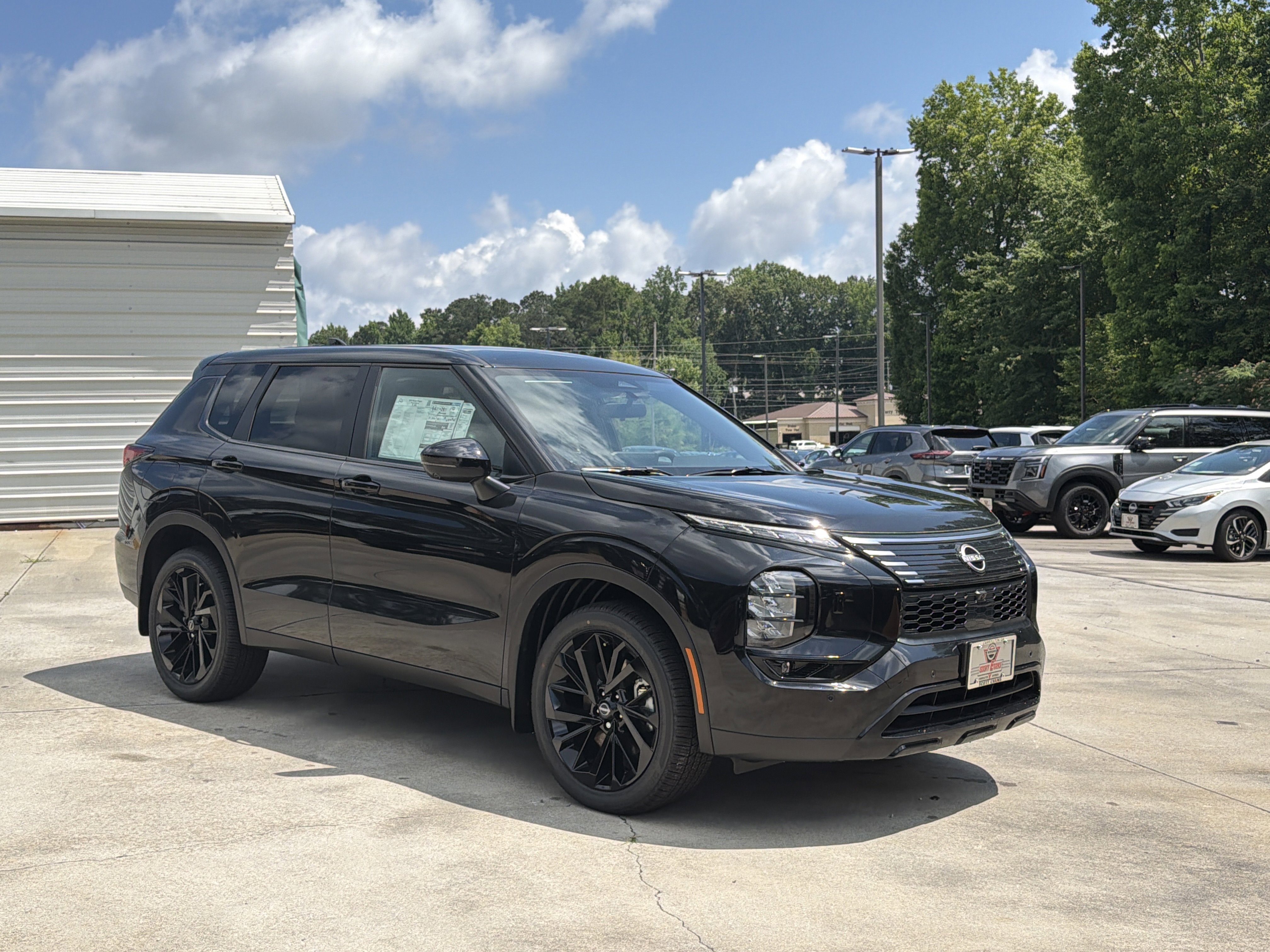 New 2026 Cosmic Black Nissan SL image 2
